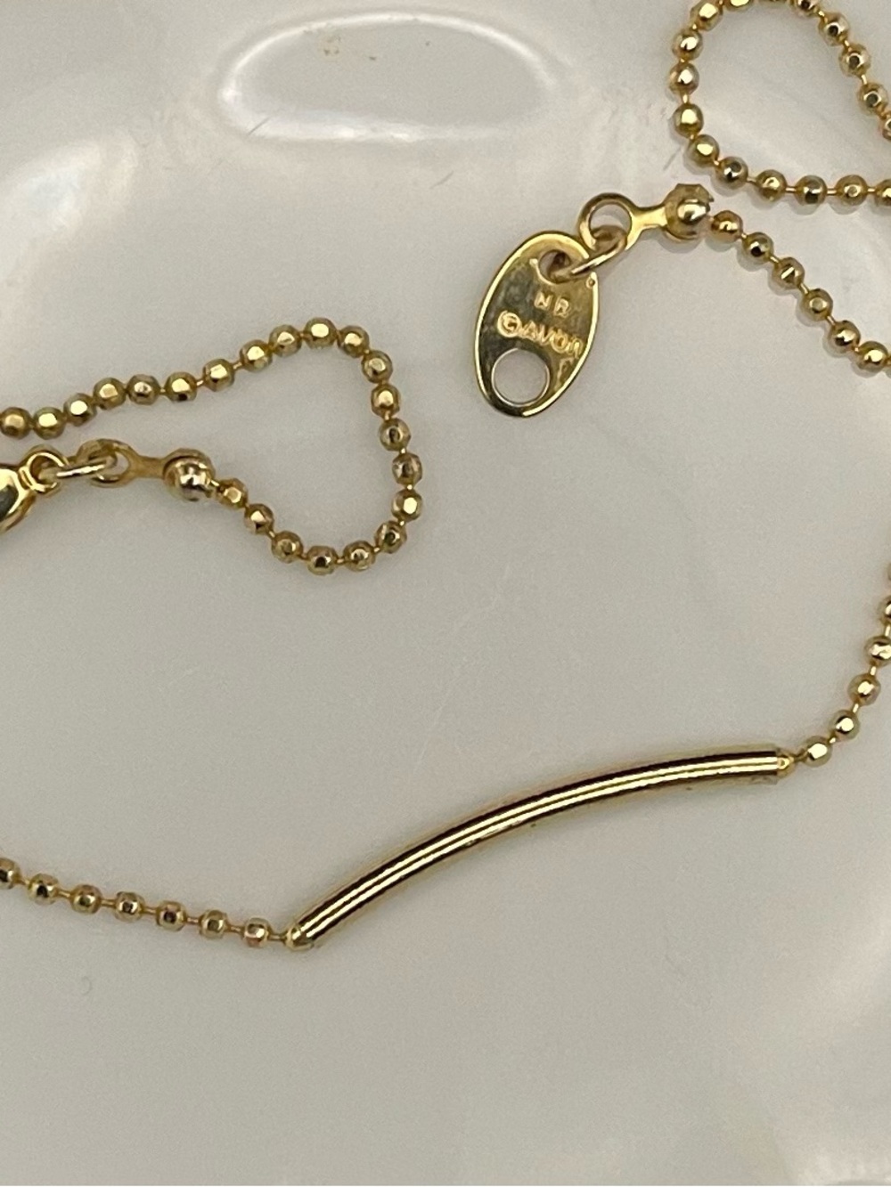 Vintage Avon gold toned curved bar ankle bracelet 9.5“ long